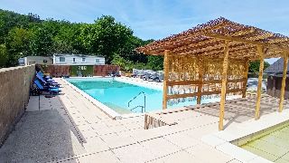 Camping La Romiguiere : Paillotte a la piscine